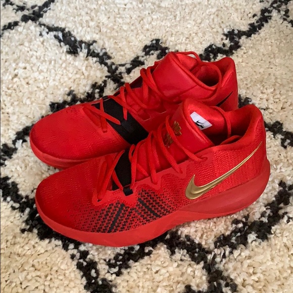 kyrie irving shoes red and gold